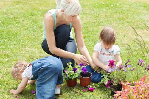 Landscape crew managing site safety around planting and groundworks